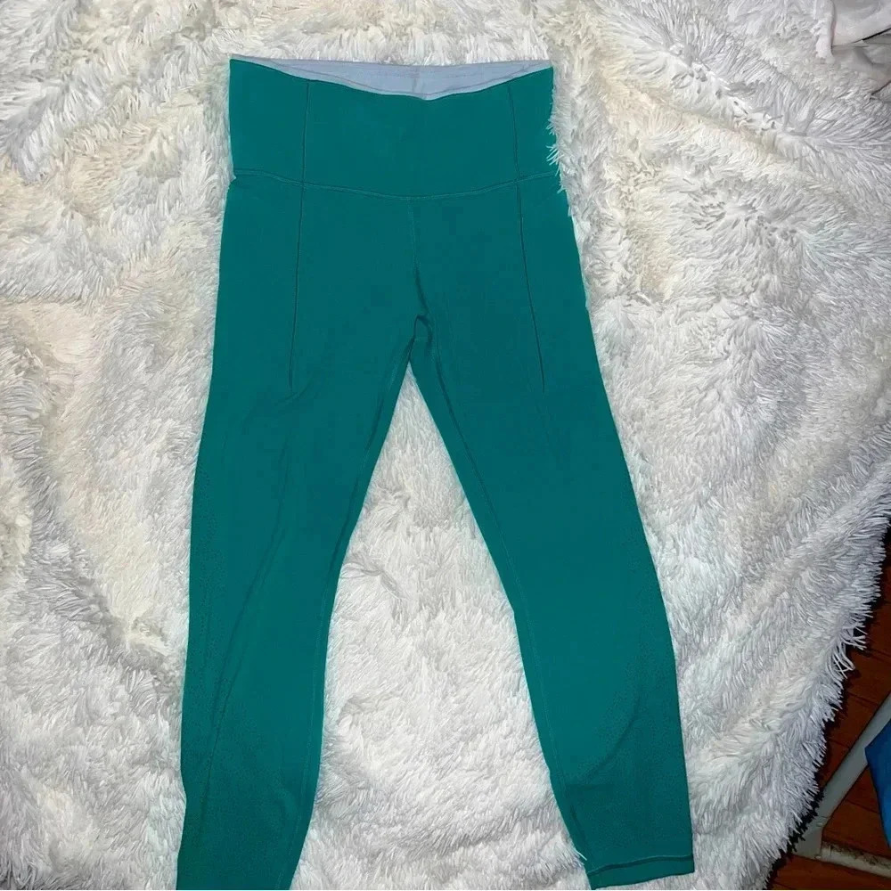 Athleta Revelation Laser Cut 7/8 Tight
